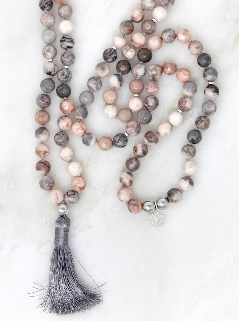 Nurture Mala hand-strung with 8mm Zebra Jasper beads and sterling silver lotus flower and findings.