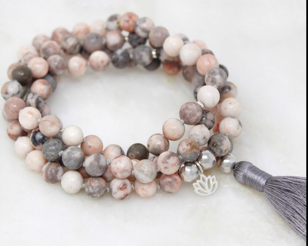 Nurture Mala hand-strung with 8mm Zebra Jasper beads and sterling silver lotus flower and findings.